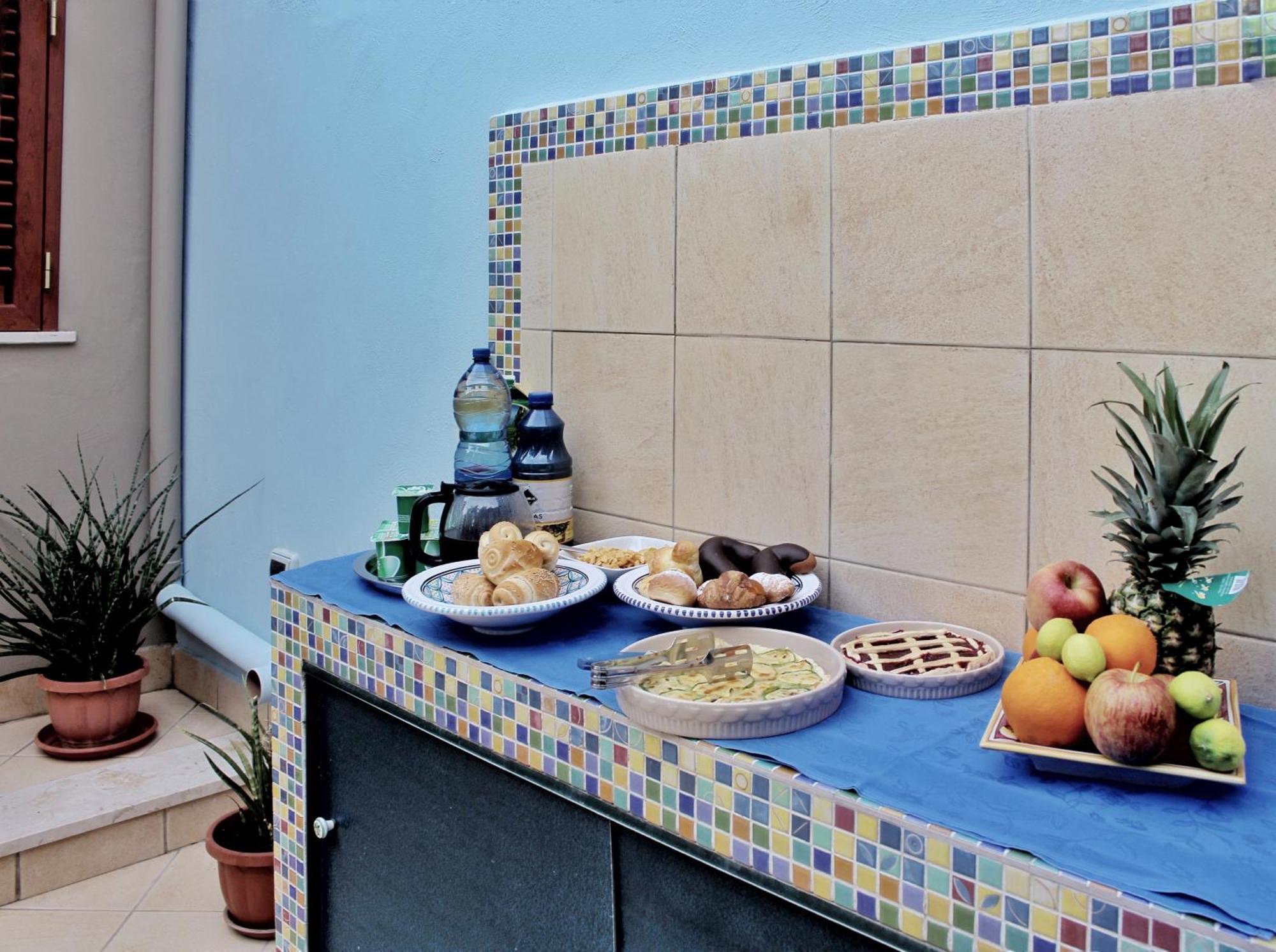 지아르디니낙소스 La Piazzetta B&B 외부 사진